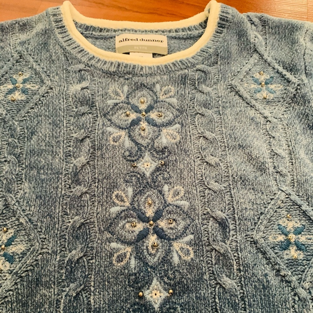 Blue knitted sweater